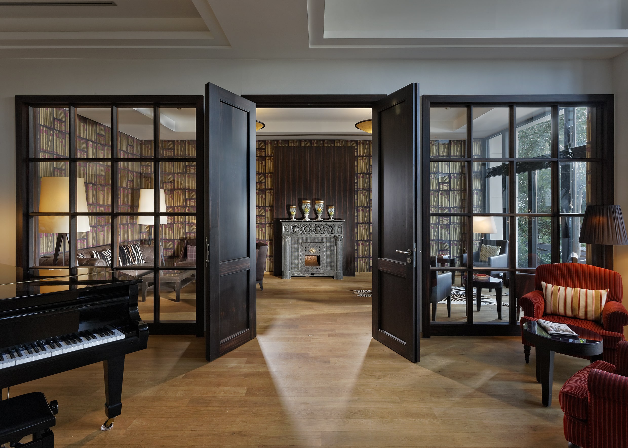 Elegance and comfort - your exclusive retreat Stylishly furnished hotel lounge area with fireplace, elegant furniture and cozy atmosphere